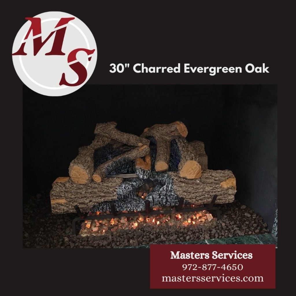 Masters Services installed Charred Evergreen Logs and painted the firebox wall black. Gas Fireplace Logs are burning