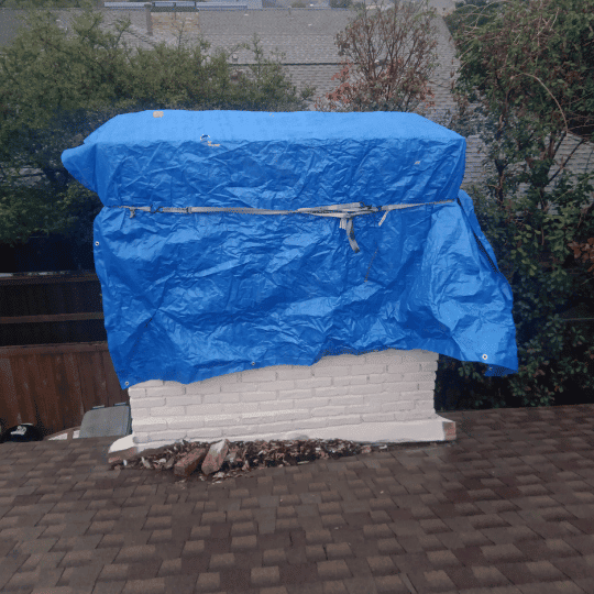 Tarped Chimney Due to Leaking during Rainfall - Chimney Leak Repair completed by Masters Services Chimney & Masonry