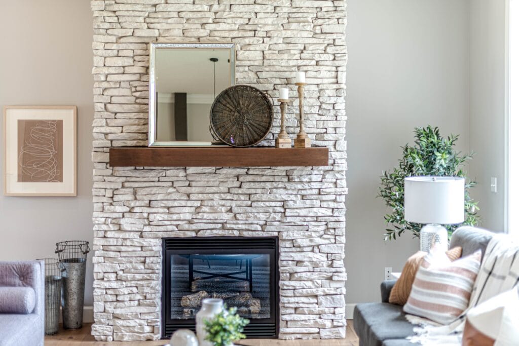 Stone Fireplace in living room. We explain to each homeowner common chimney problems and how to prevent them.