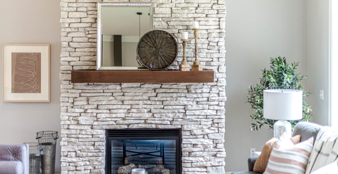 Stone Fireplace in living room. We explain to each homeowner common chimney problems and how to prevent them.