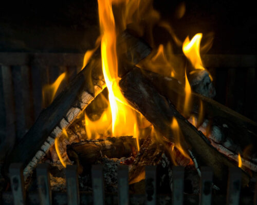 Logs burning in fireplace