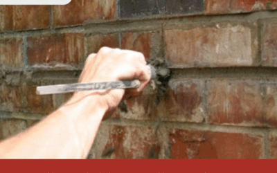 Masters Services team performing chimney tuckpointing on a brick chimney